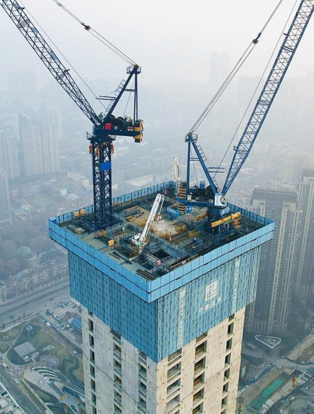 Tower core with twin tower cranes, aerial