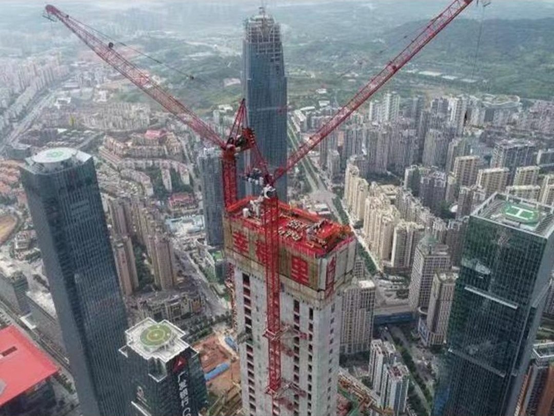 High-rise core climbing above the city